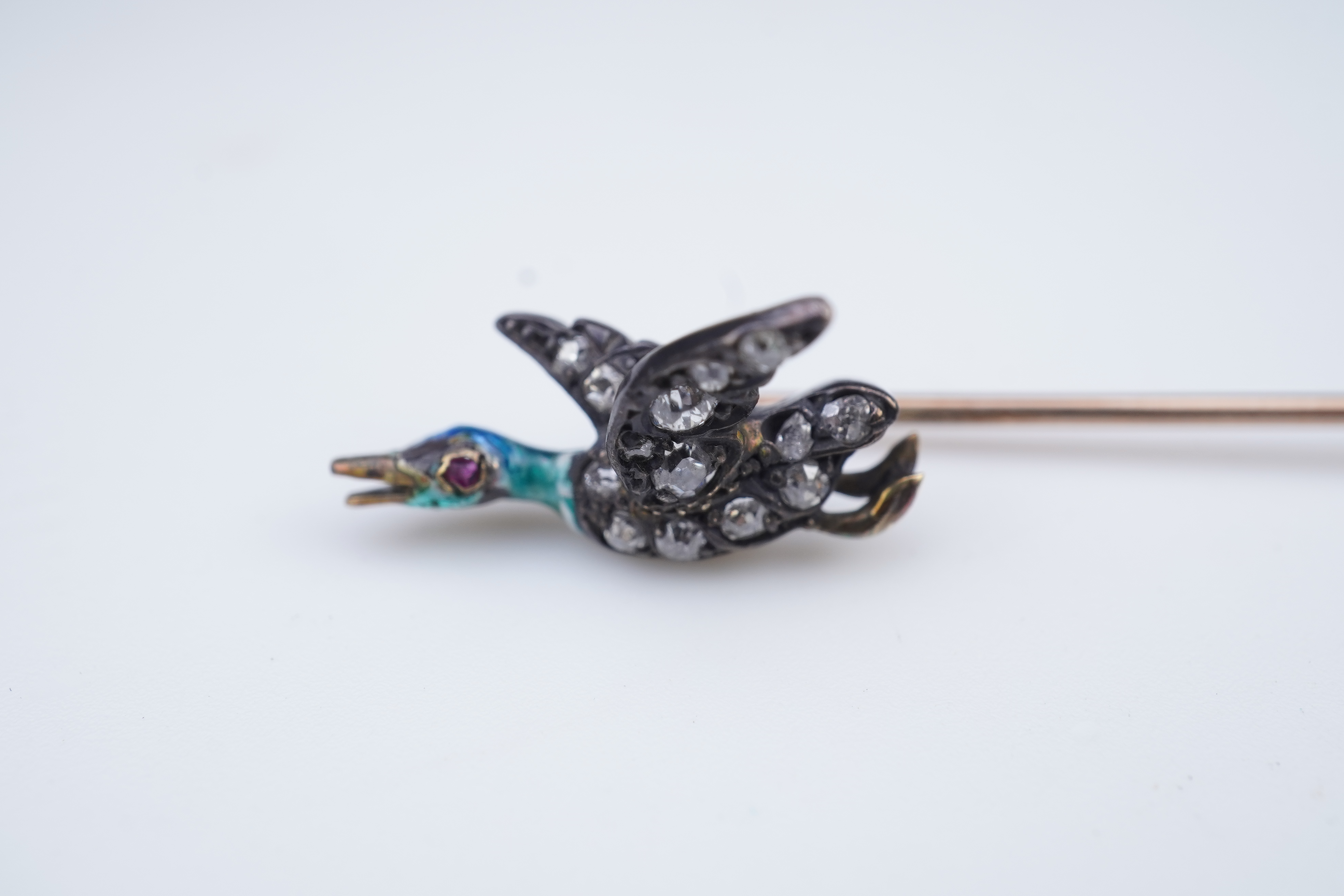A pair of novelty enamel and diamond stick pins, circa 1900